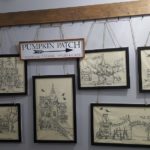Wall display of Halloween stitching